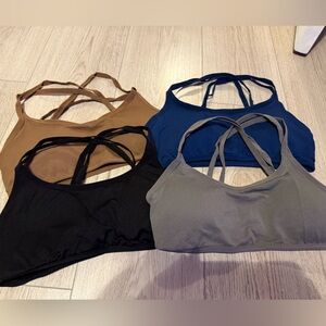 Woman’s Sports Bras in Black, Brown, Gray, and Blue